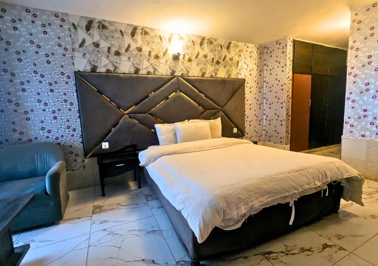 Bed in Grand Heights Hotel