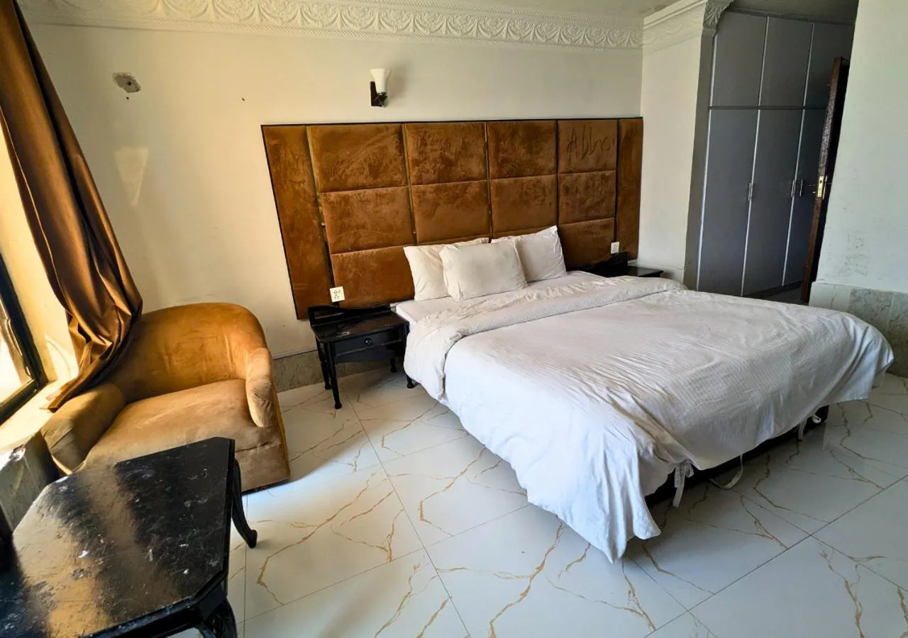 Bed in Grand Heights Hotel