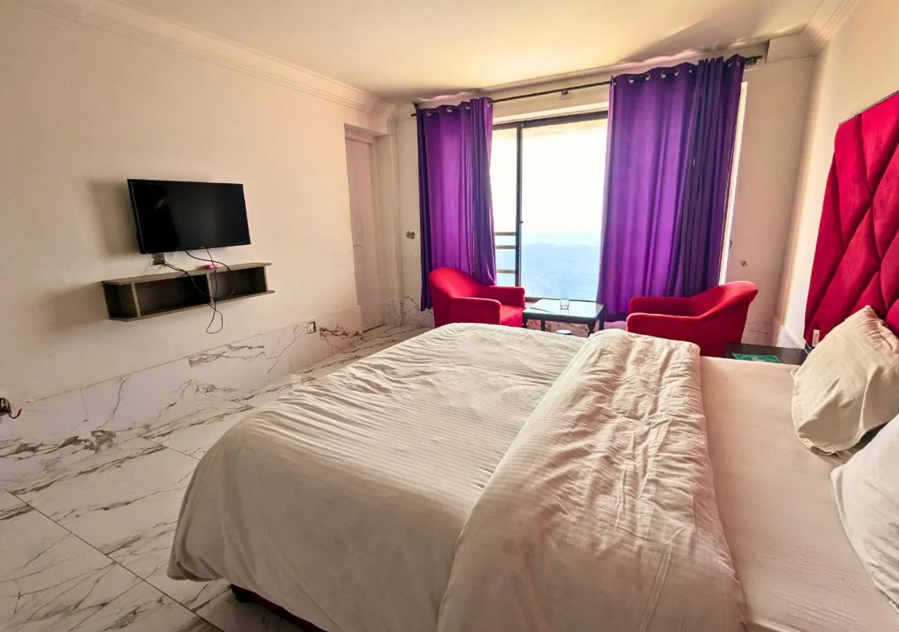 Bed in Grand Heights Hotel