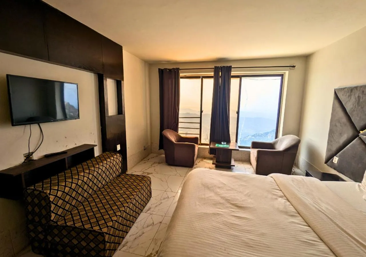 Bed in Grand Heights Hotel