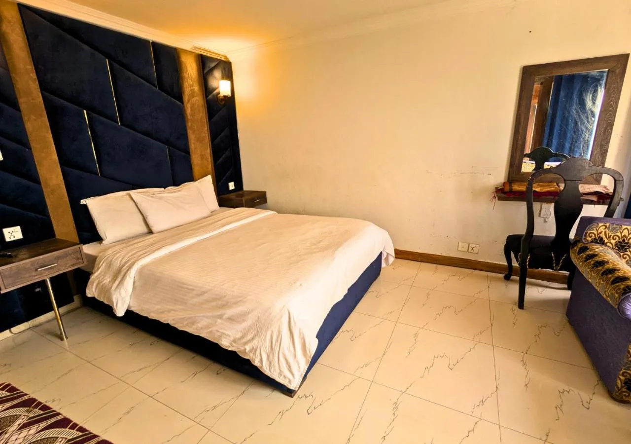 Bed in Grand Heights Hotel