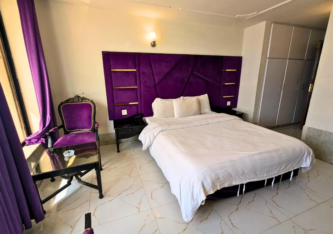 Bed in Grand Heights Hotel
