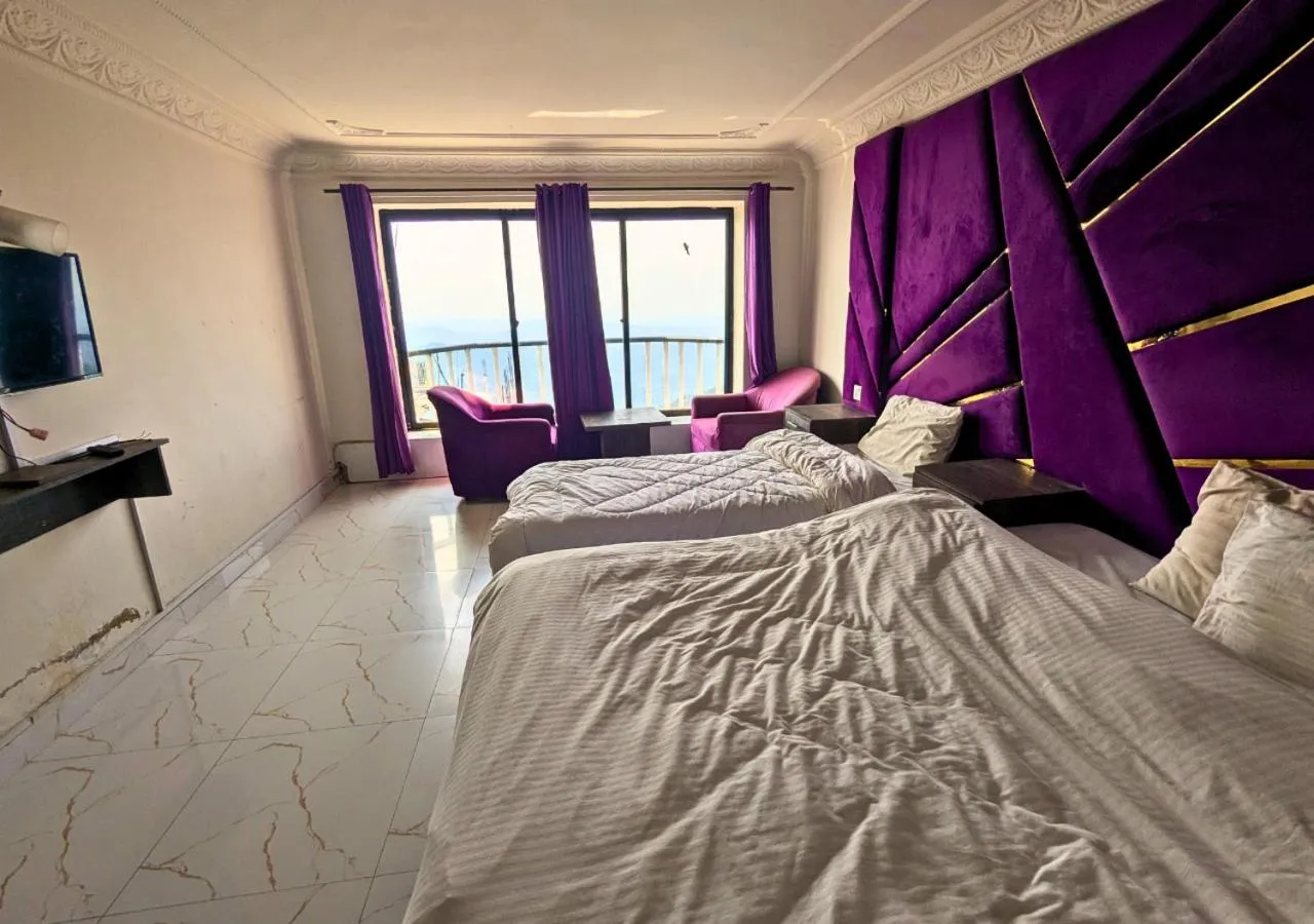 Bed in Grand Heights Hotel