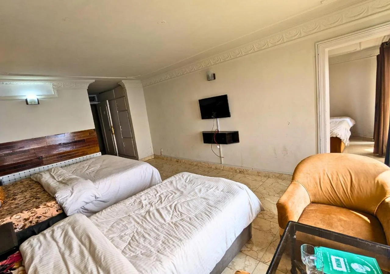 Bed in Grand Heights Hotel