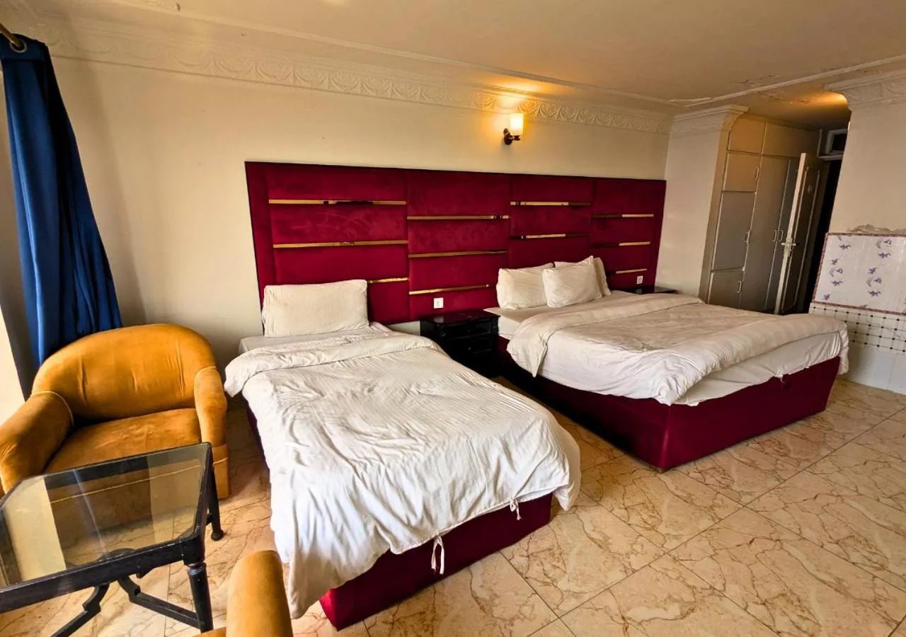 Bed in Grand Heights Hotel
