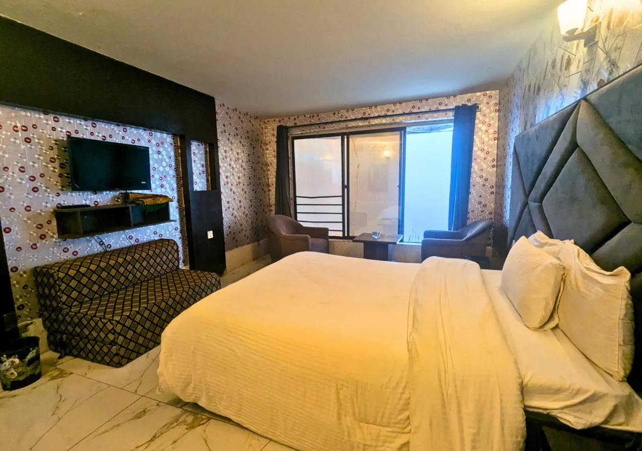 Bedroom, Bed in Grand Heights Hotel