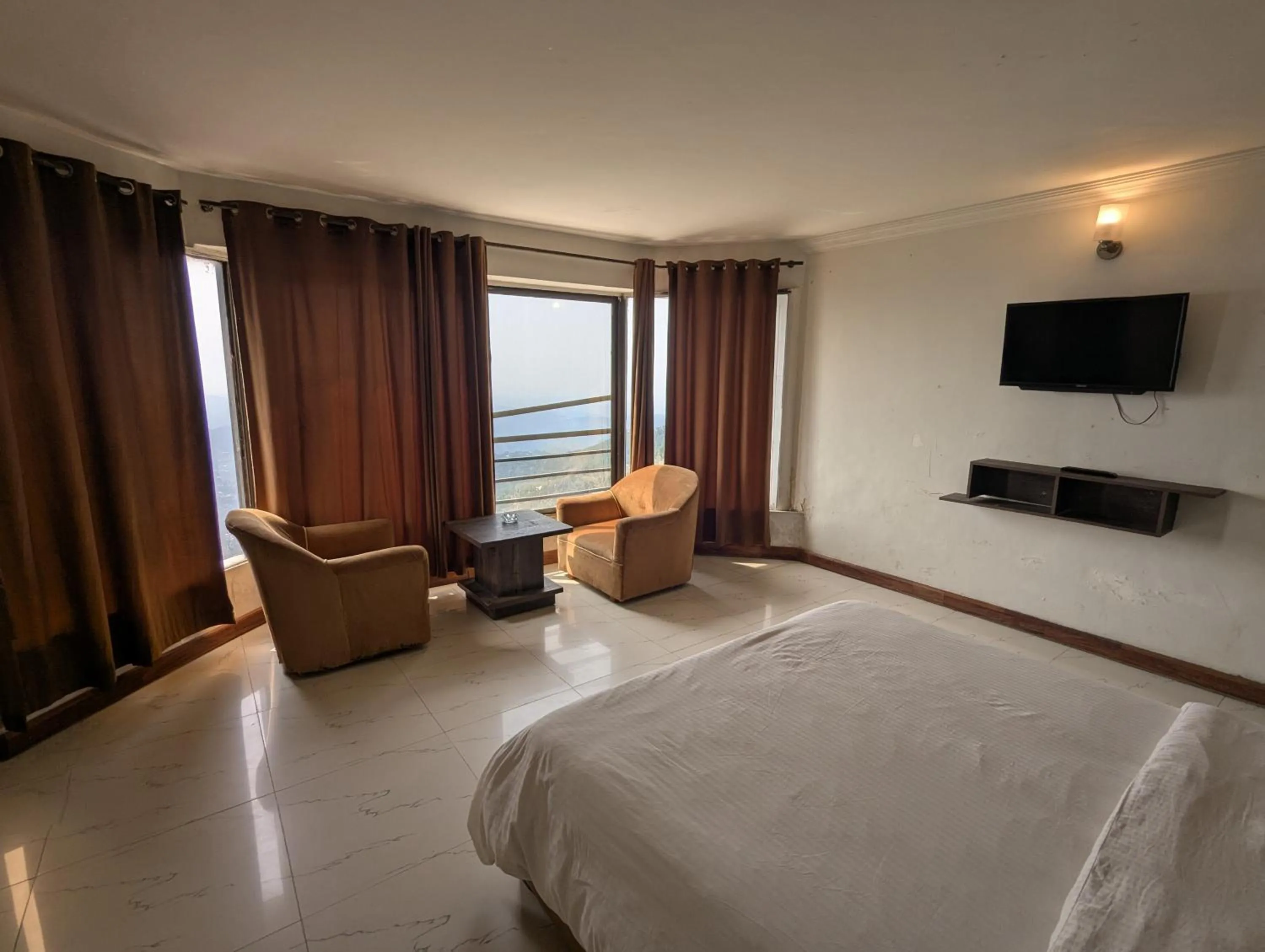 Bed in Grand Heights Hotel