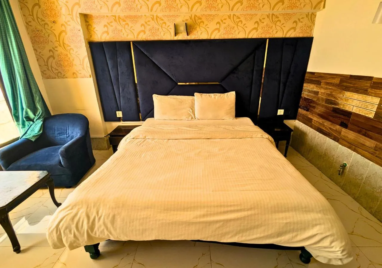 Bed in Grand Heights Hotel