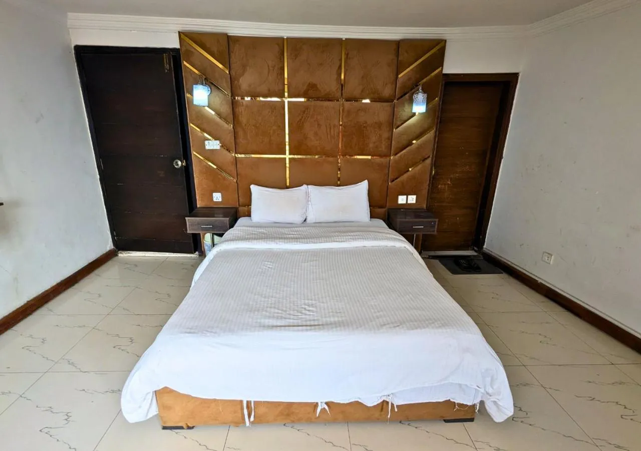 Bed in Grand Heights Hotel