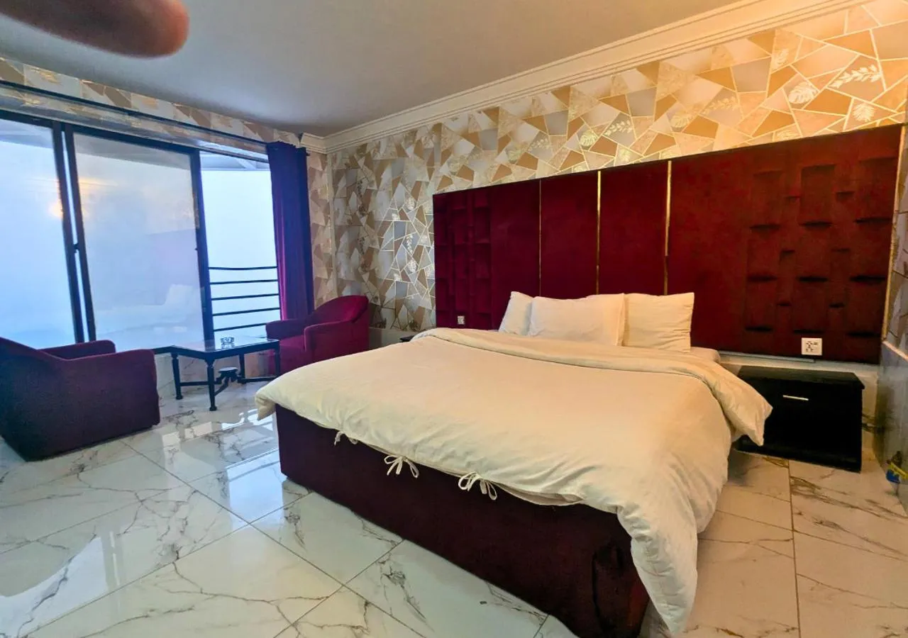 Bed in Grand Heights Hotel