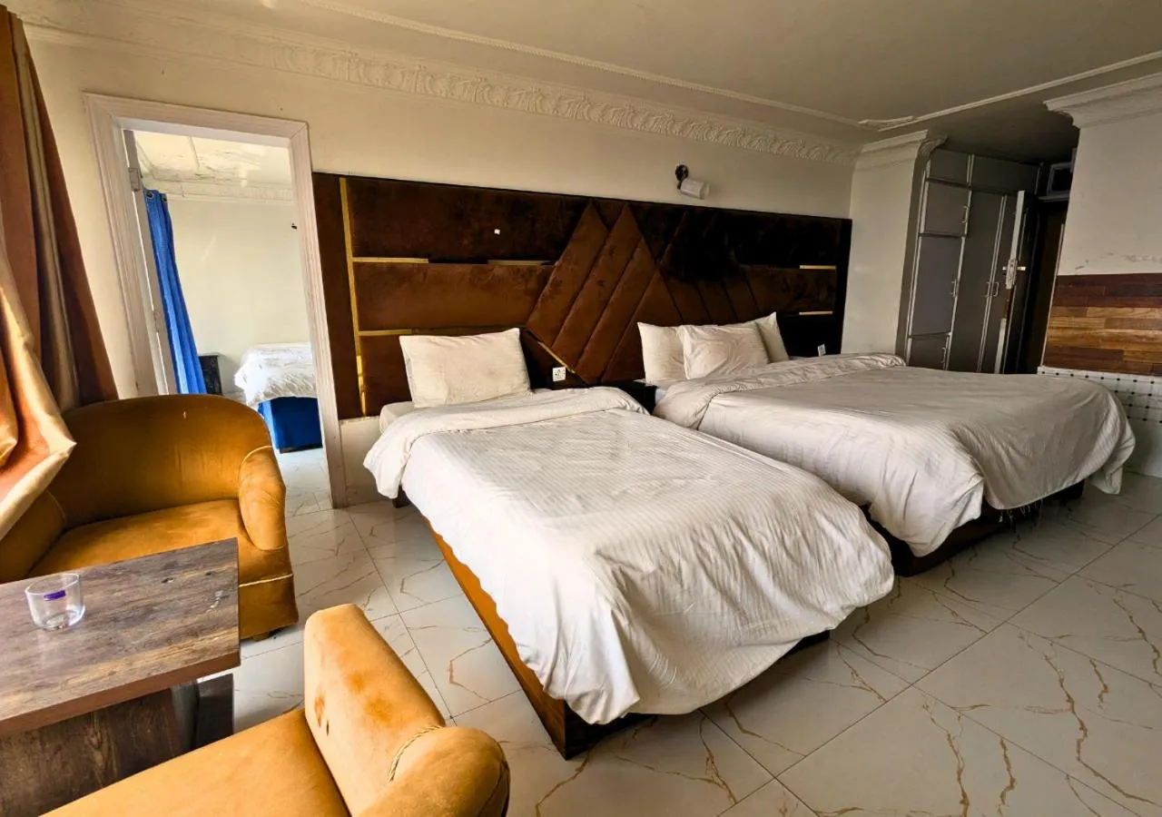 Bed in Grand Heights Hotel