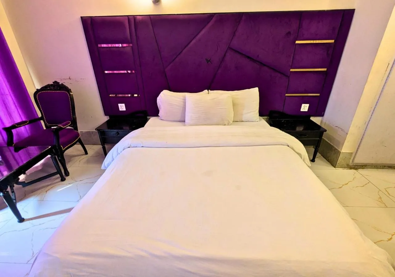 Bed in Grand Heights Hotel
