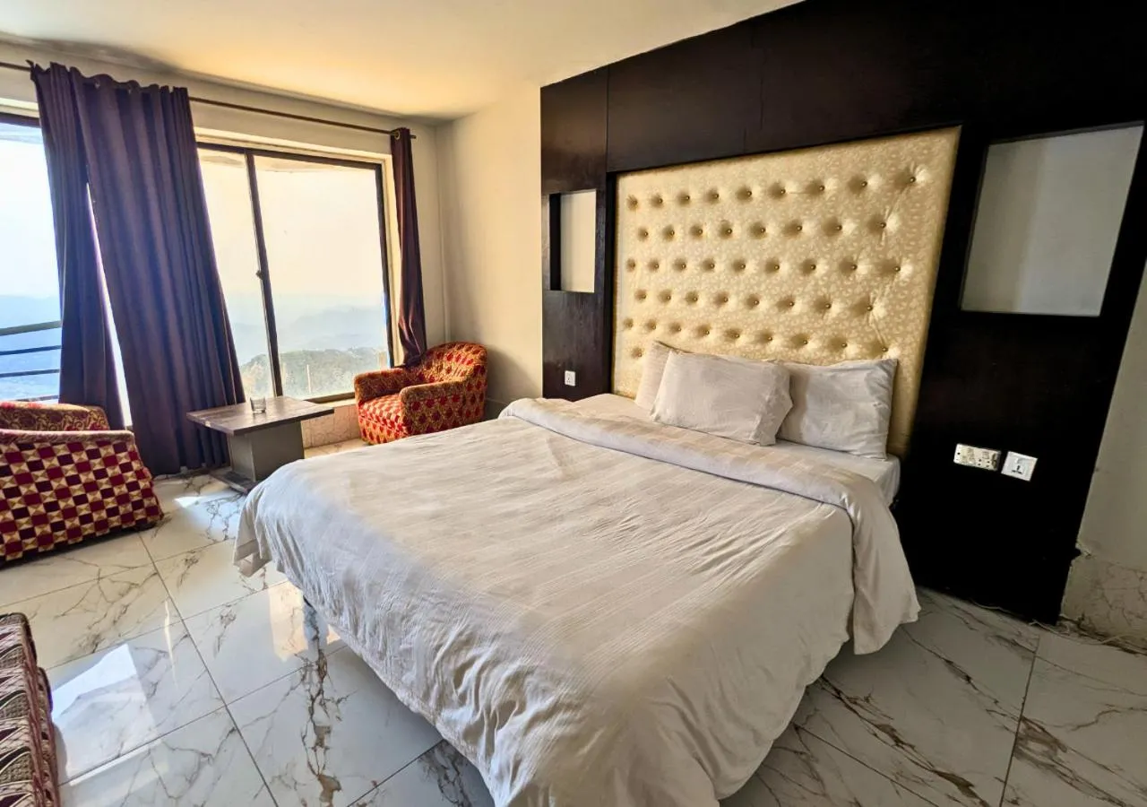 Bed in Grand Heights Hotel