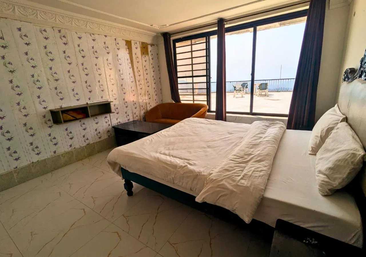 Bed in Grand Heights Hotel