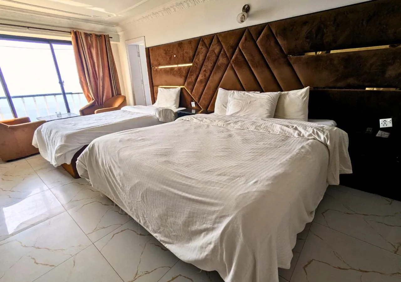 Bed in Grand Heights Hotel