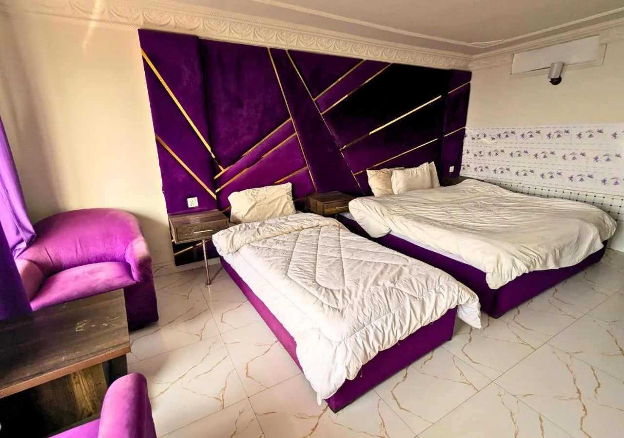 Bed in Grand Heights Hotel