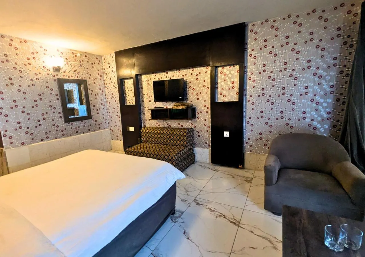 Bed in Grand Heights Hotel