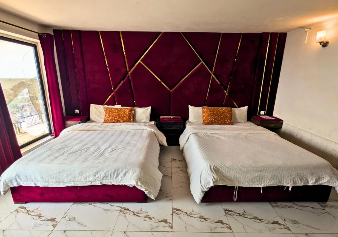 Bed in Grand Heights Hotel