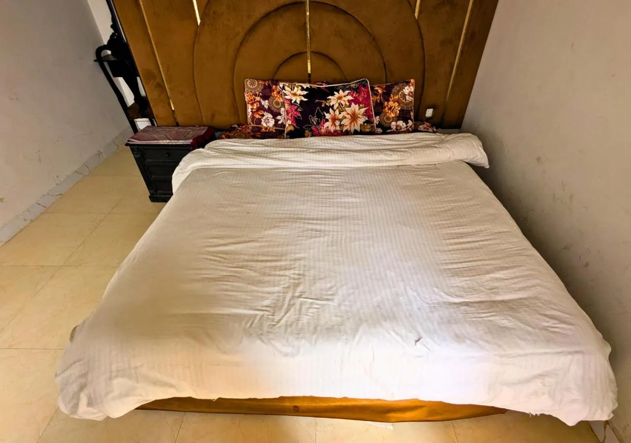 Bed in Grand Heights Hotel