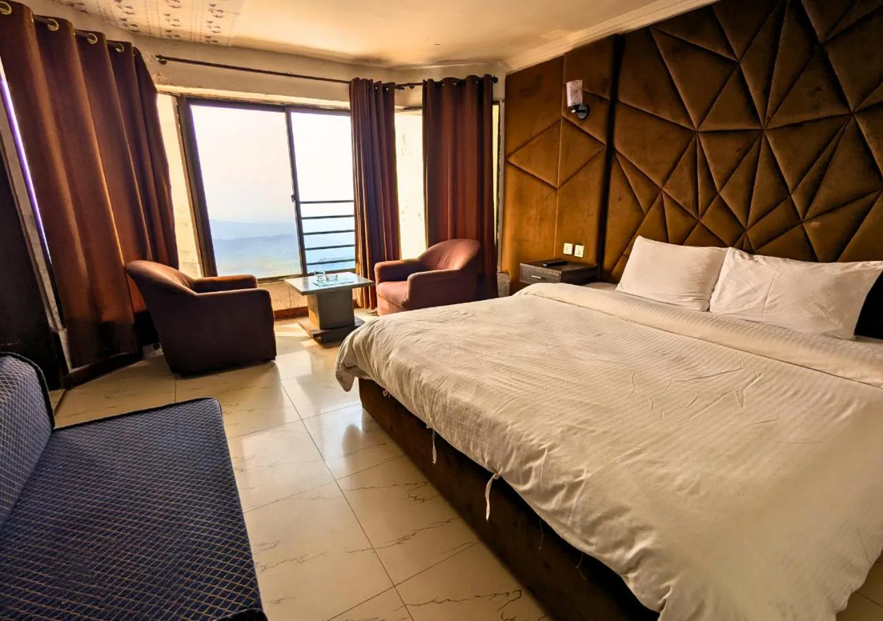 Bed in Grand Heights Hotel