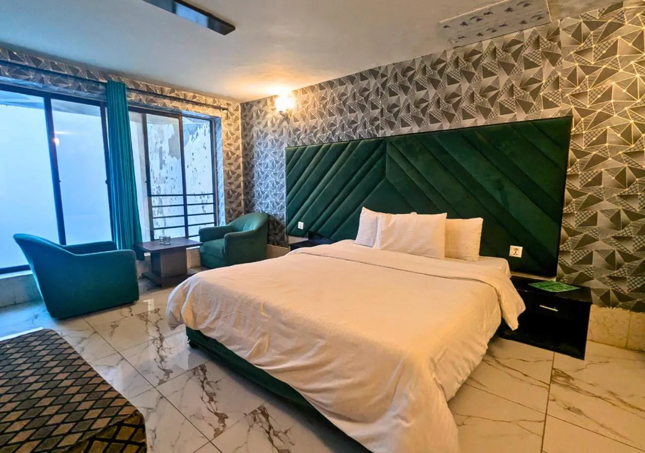 Bed in Grand Heights Hotel