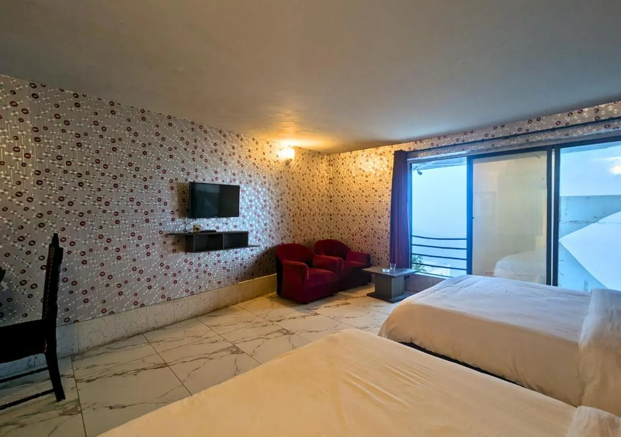Bed in Grand Heights Hotel