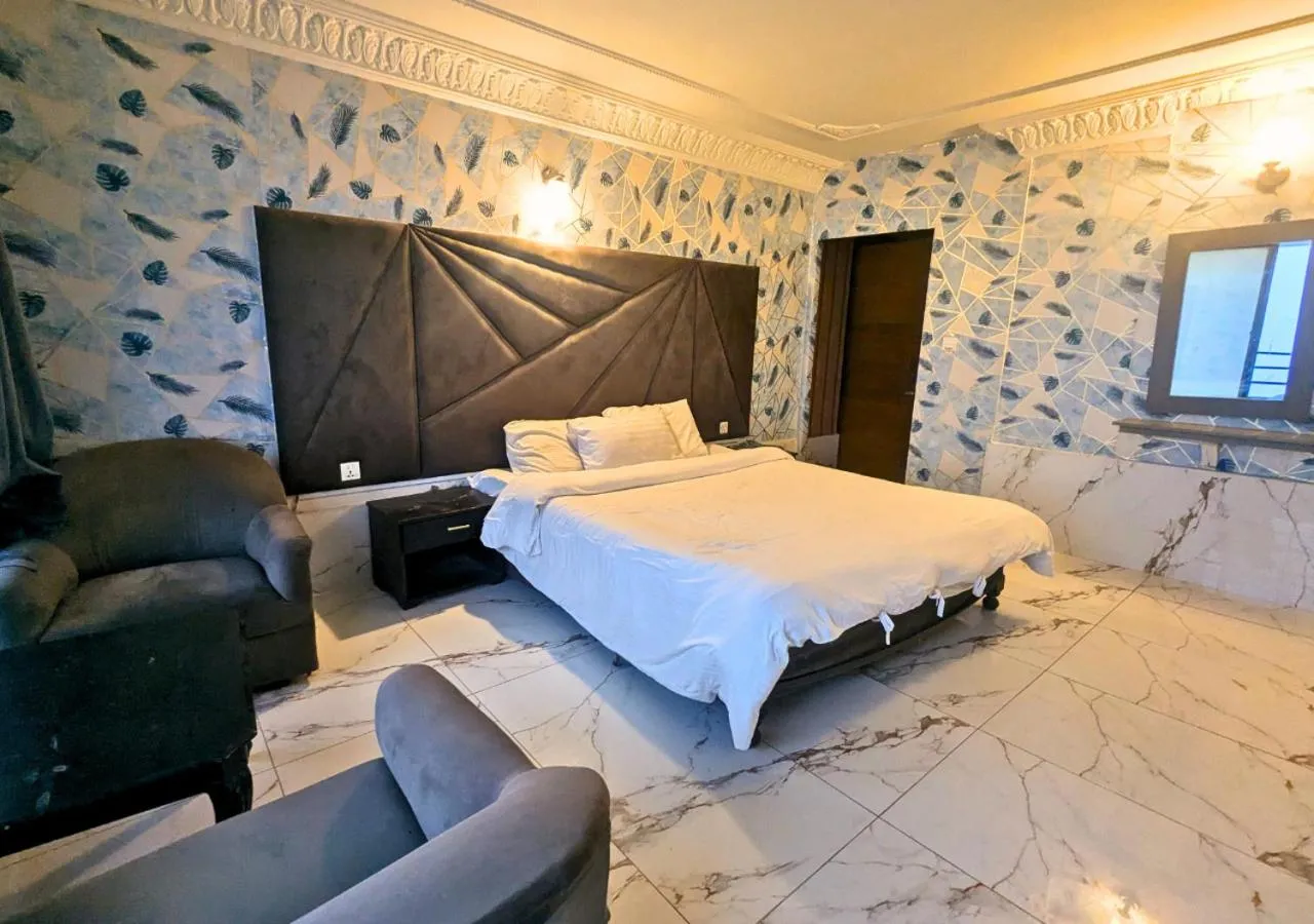 Bed in Grand Heights Hotel