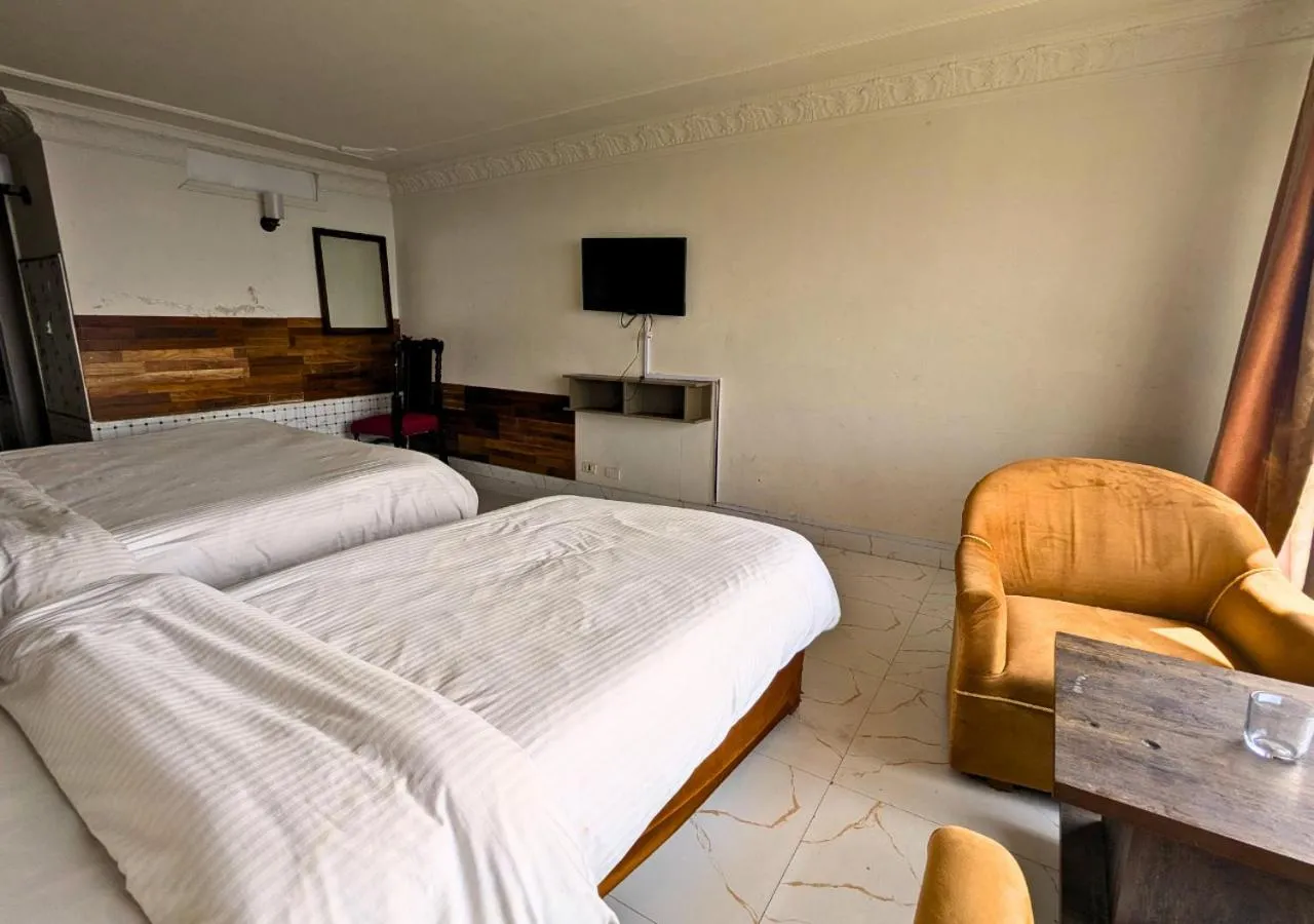 Bed in Grand Heights Hotel