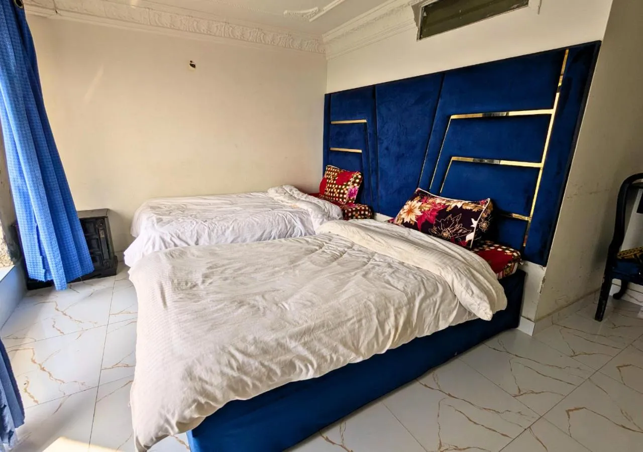 Bed in Grand Heights Hotel
