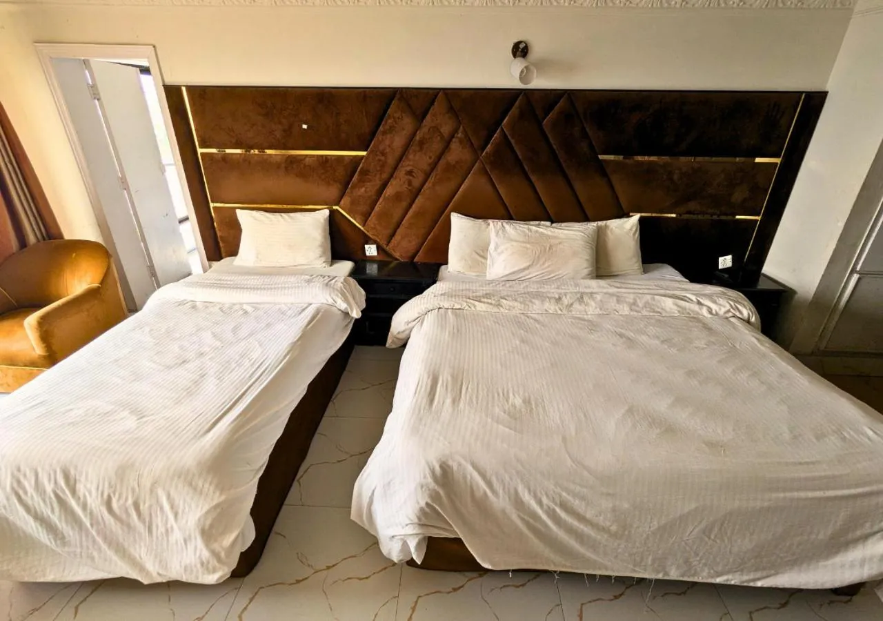 Bed in Grand Heights Hotel