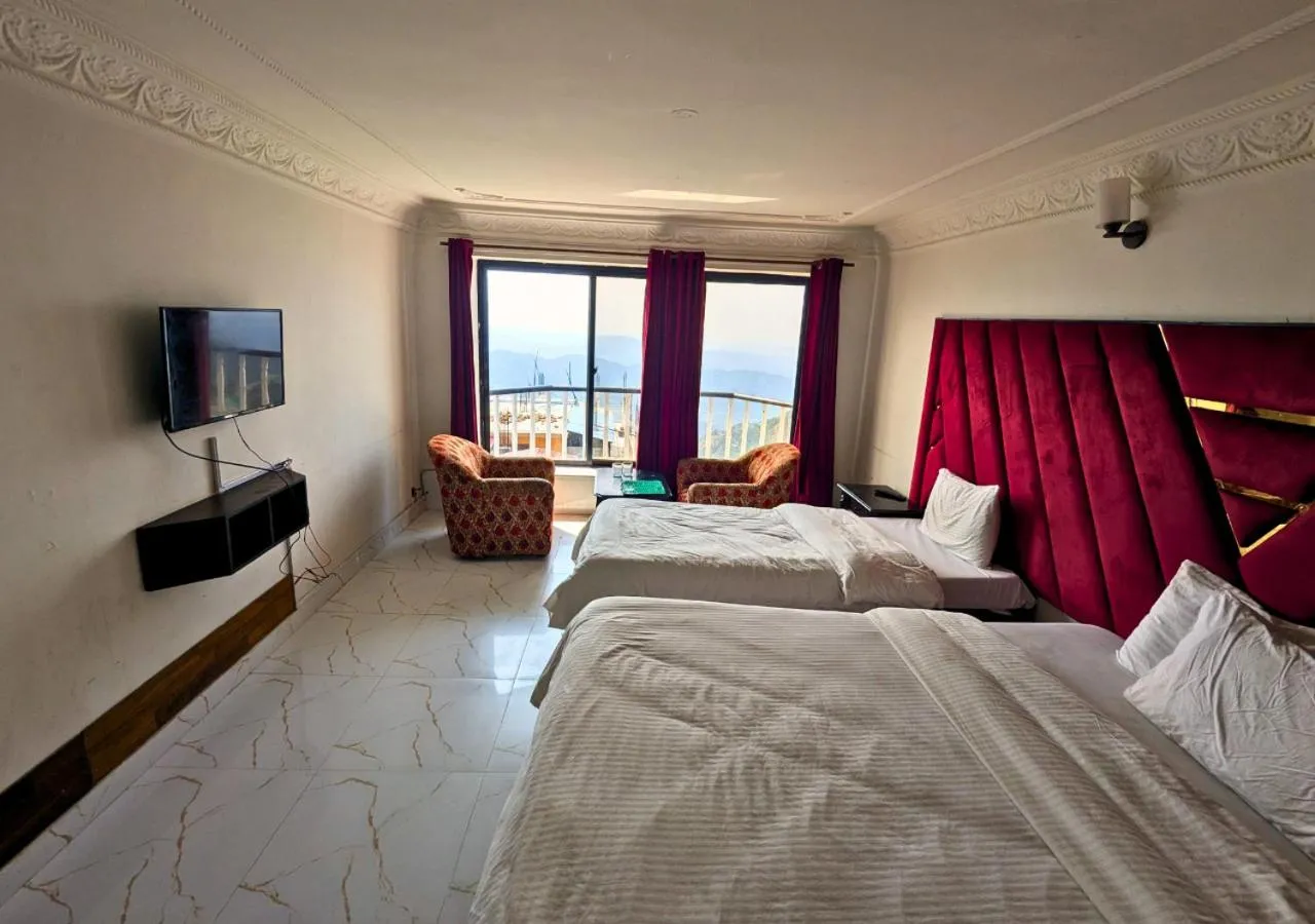 Bed in Grand Heights Hotel