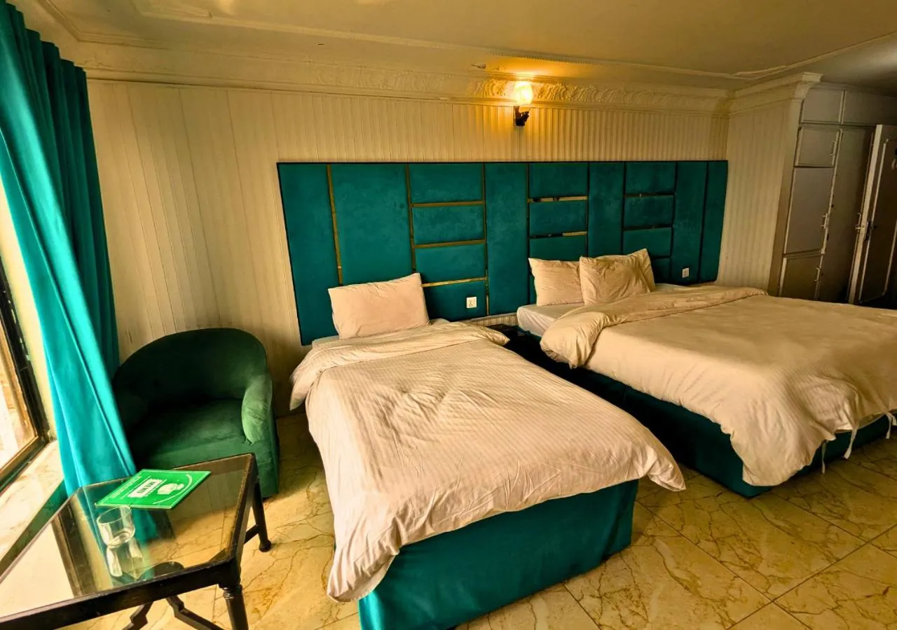 Bed in Grand Heights Hotel