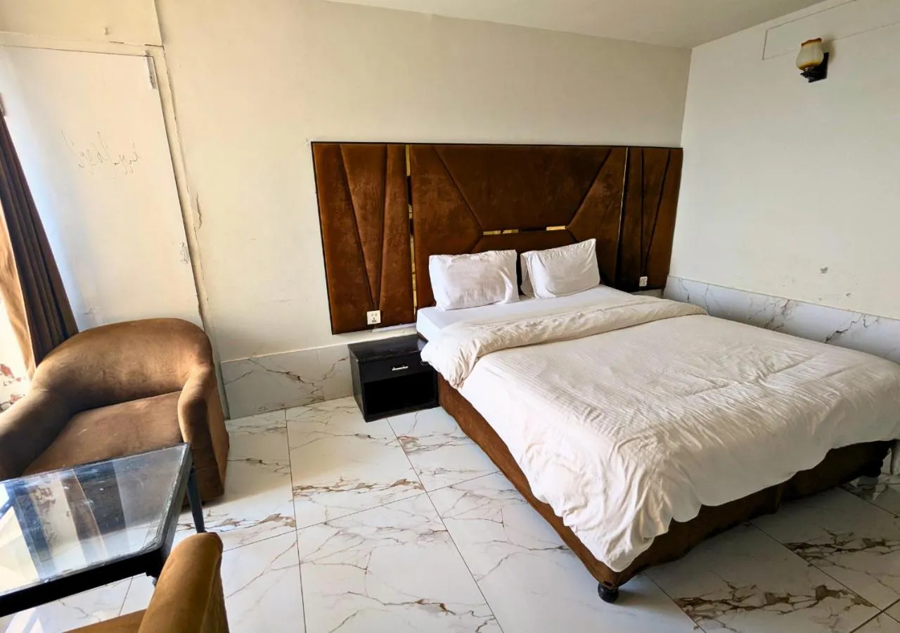 Bed in Grand Heights Hotel