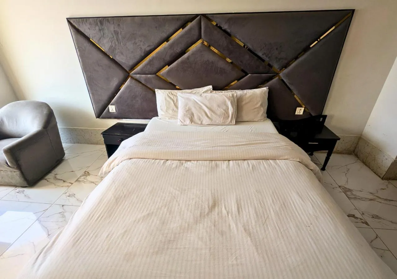 Bed in Grand Heights Hotel