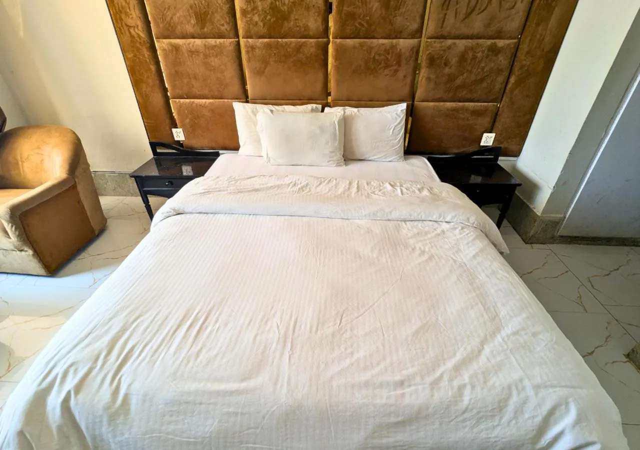 Bed in Grand Heights Hotel