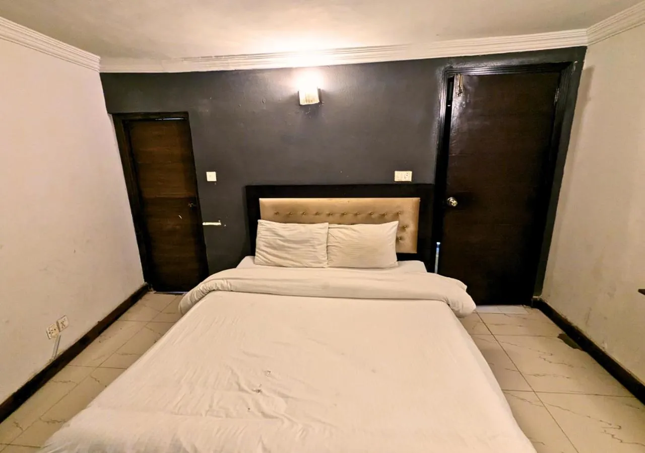 Bed in Grand Heights Hotel