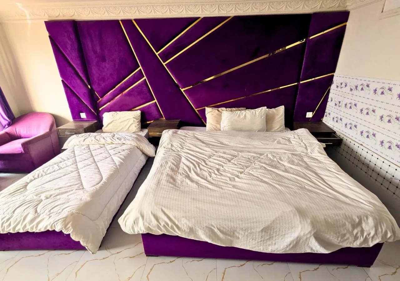 Bed in Grand Heights Hotel