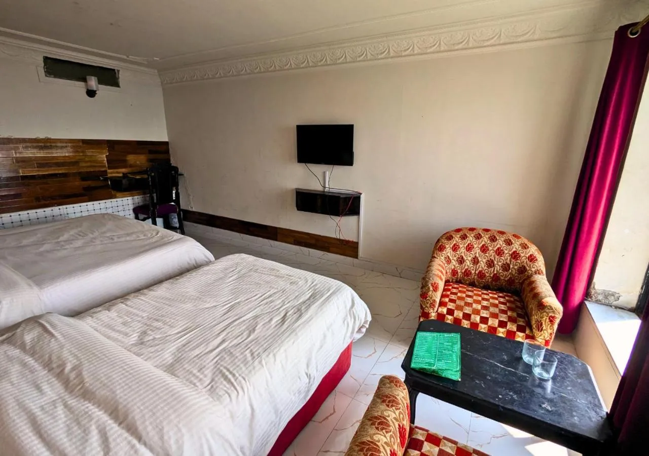 Bed in Grand Heights Hotel