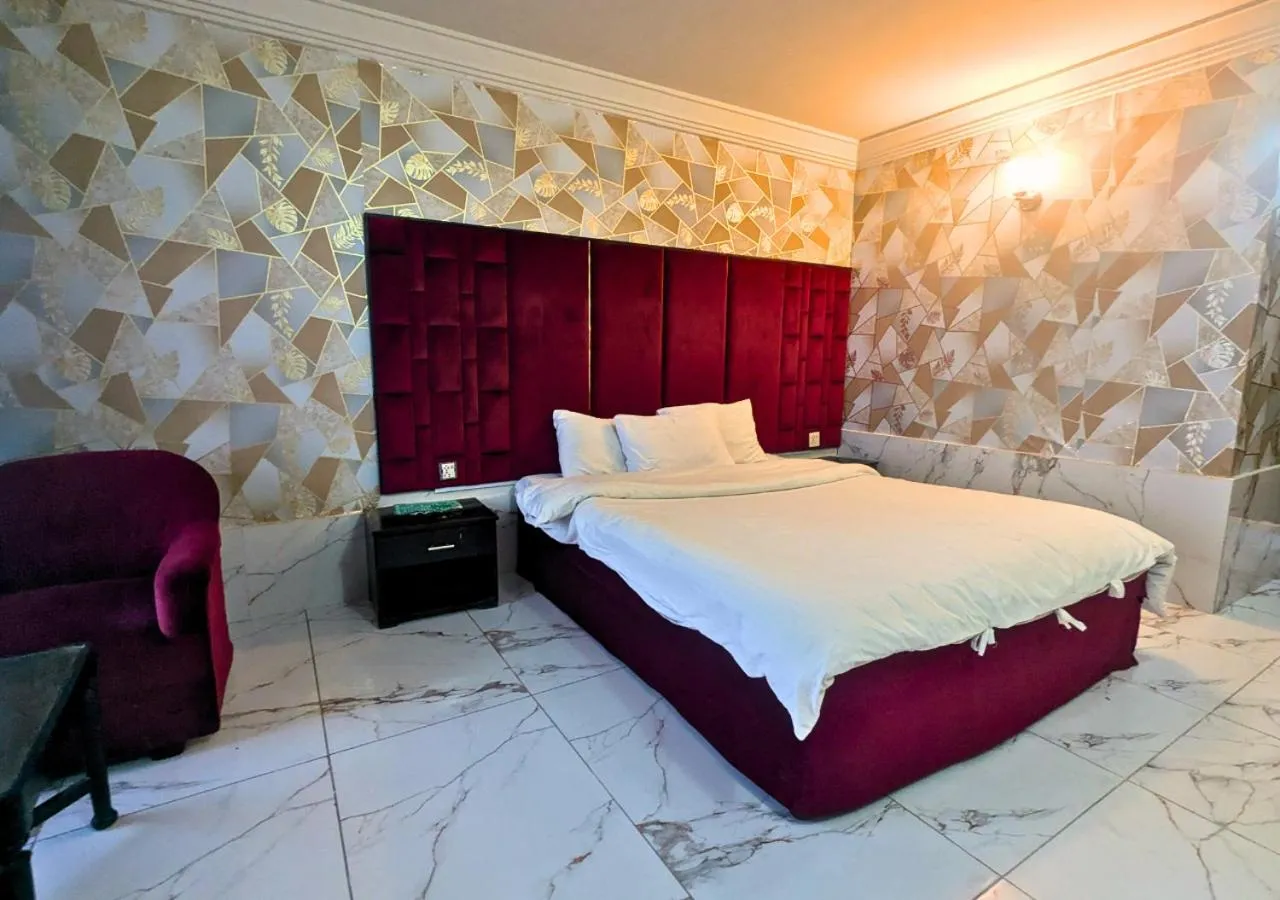 Bed in Grand Heights Hotel