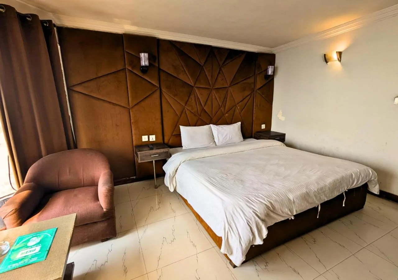 Bed in Grand Heights Hotel