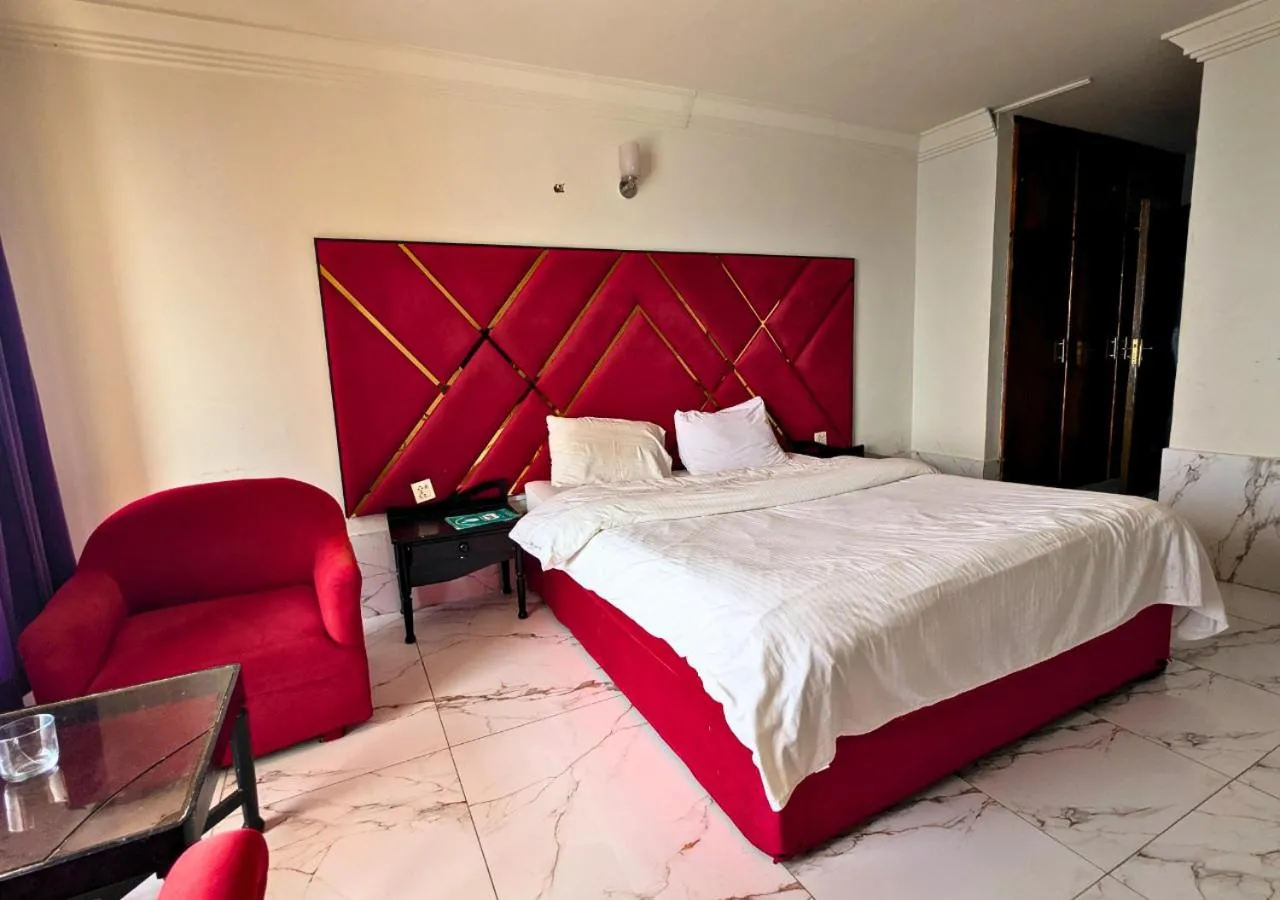 Bed in Grand Heights Hotel