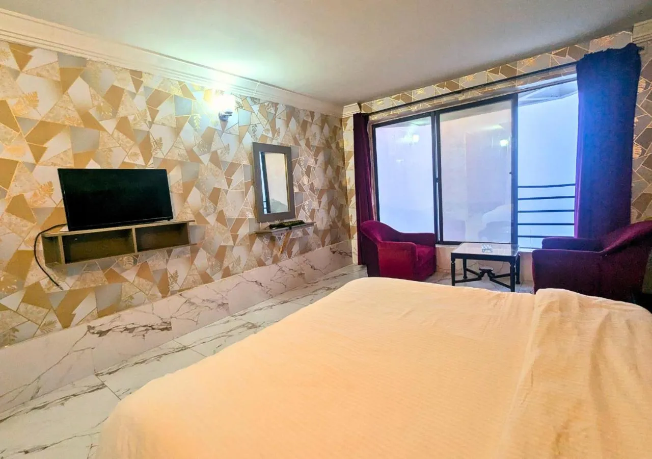 TV and multimedia, Bed in Grand Heights Hotel