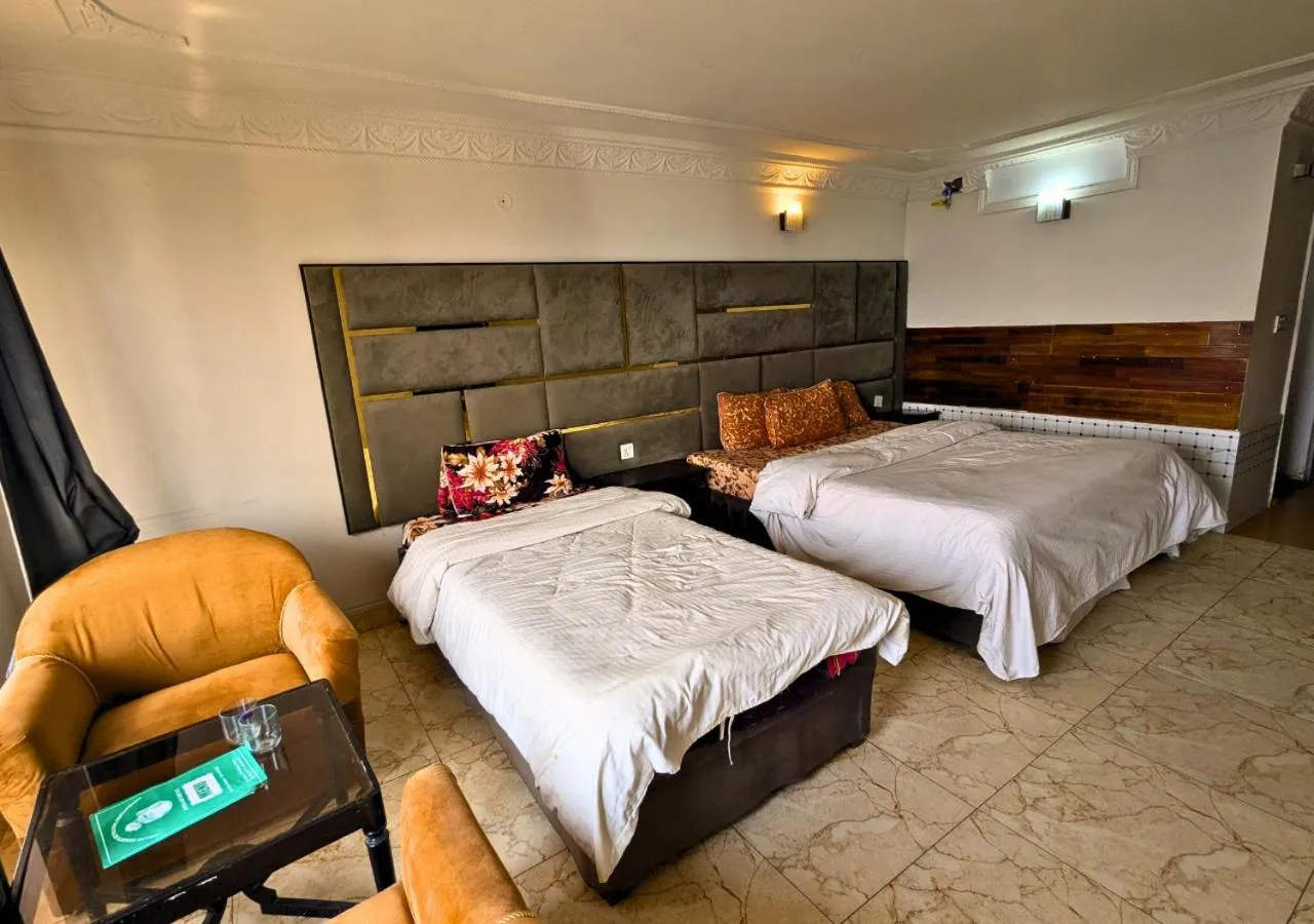 Bed in Grand Heights Hotel