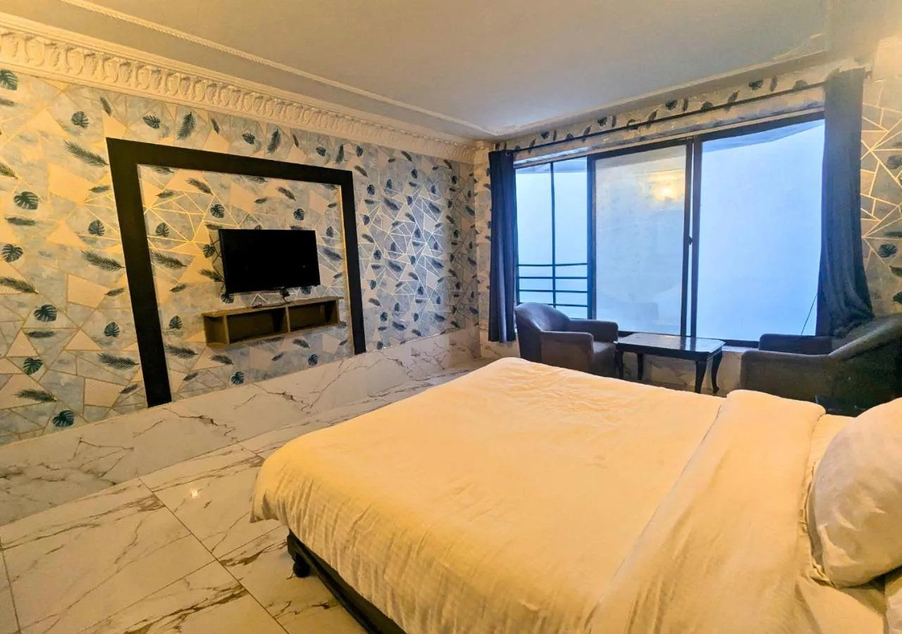 Bed in Grand Heights Hotel