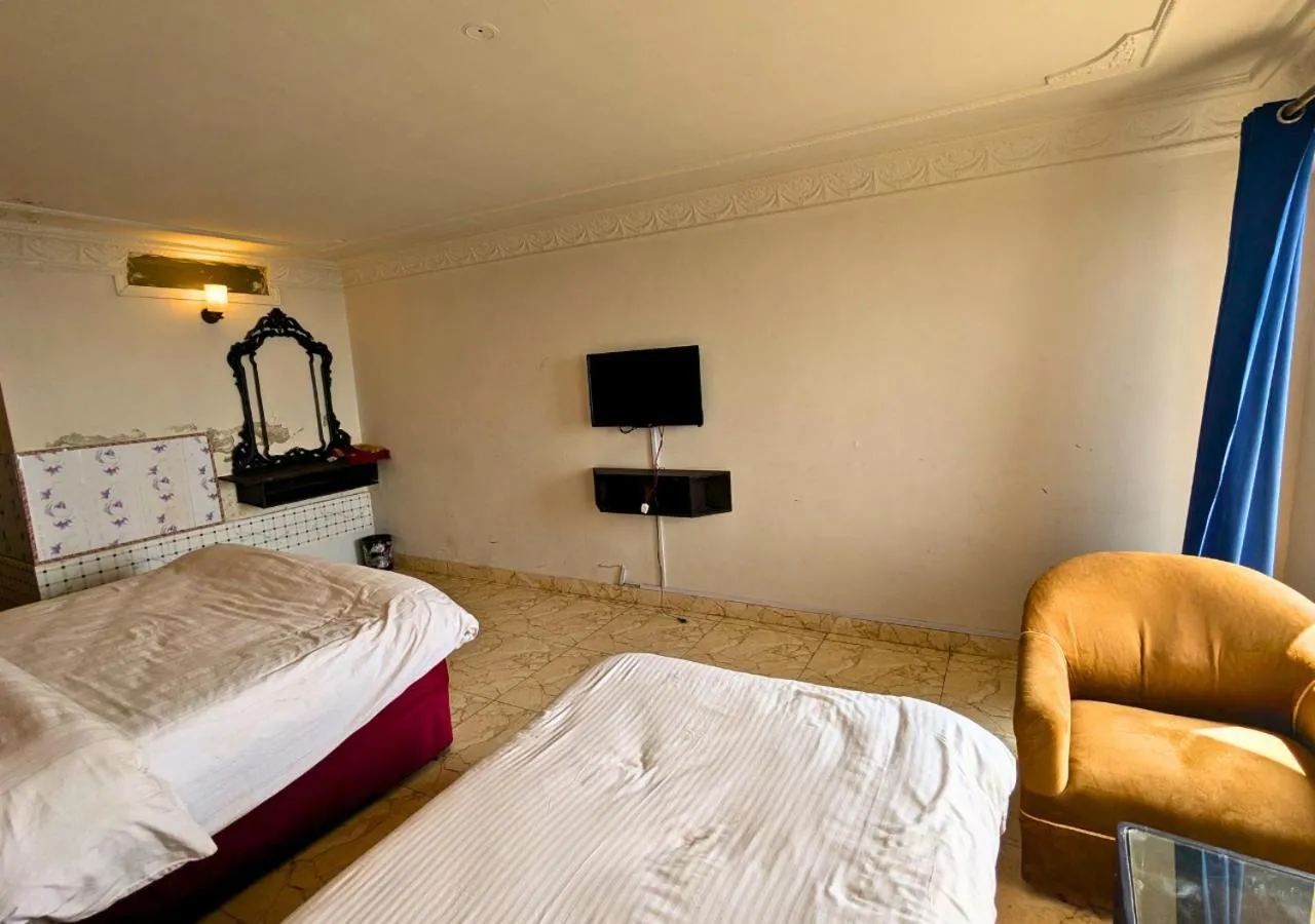 Bed in Grand Heights Hotel