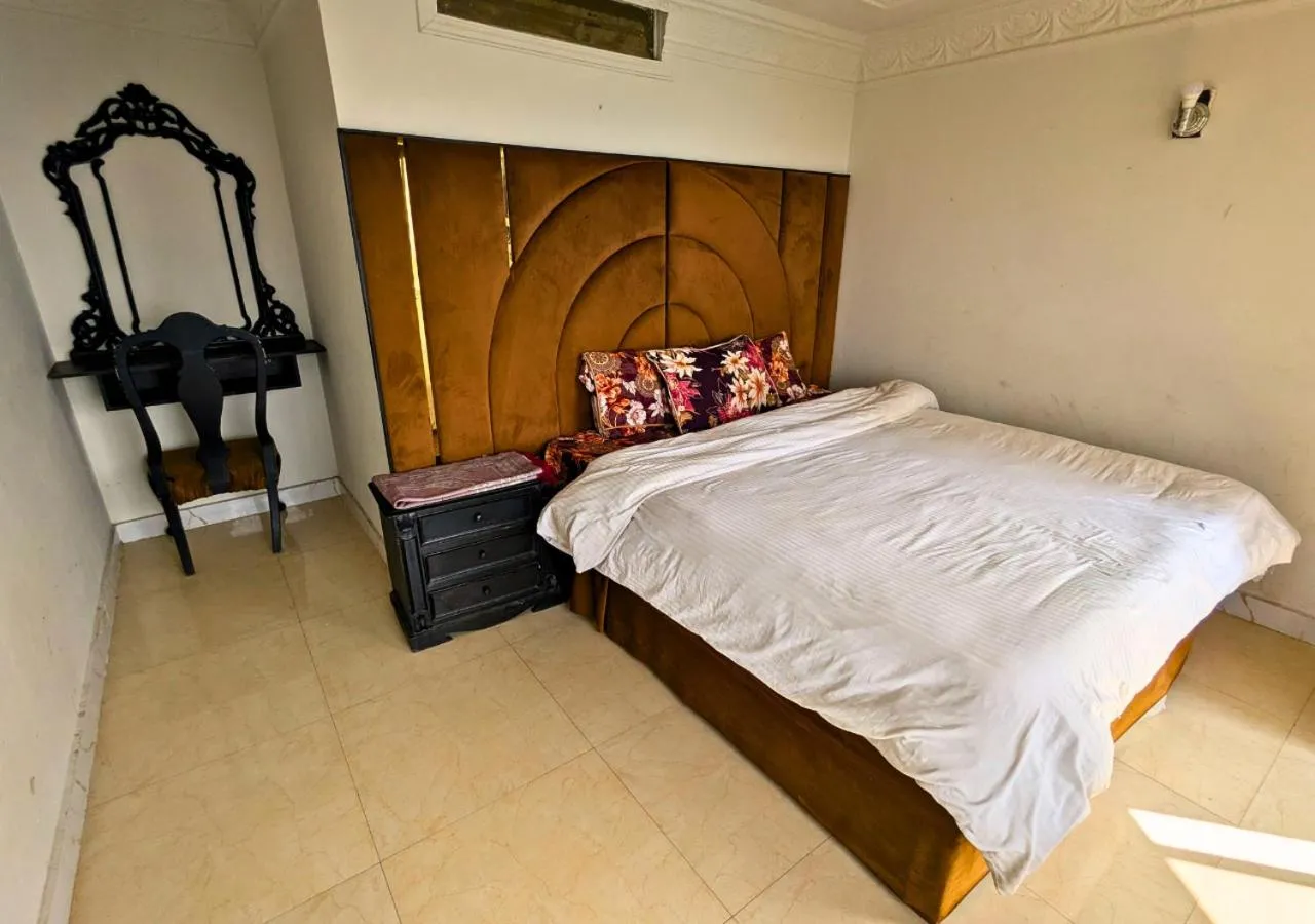 Bed in Grand Heights Hotel