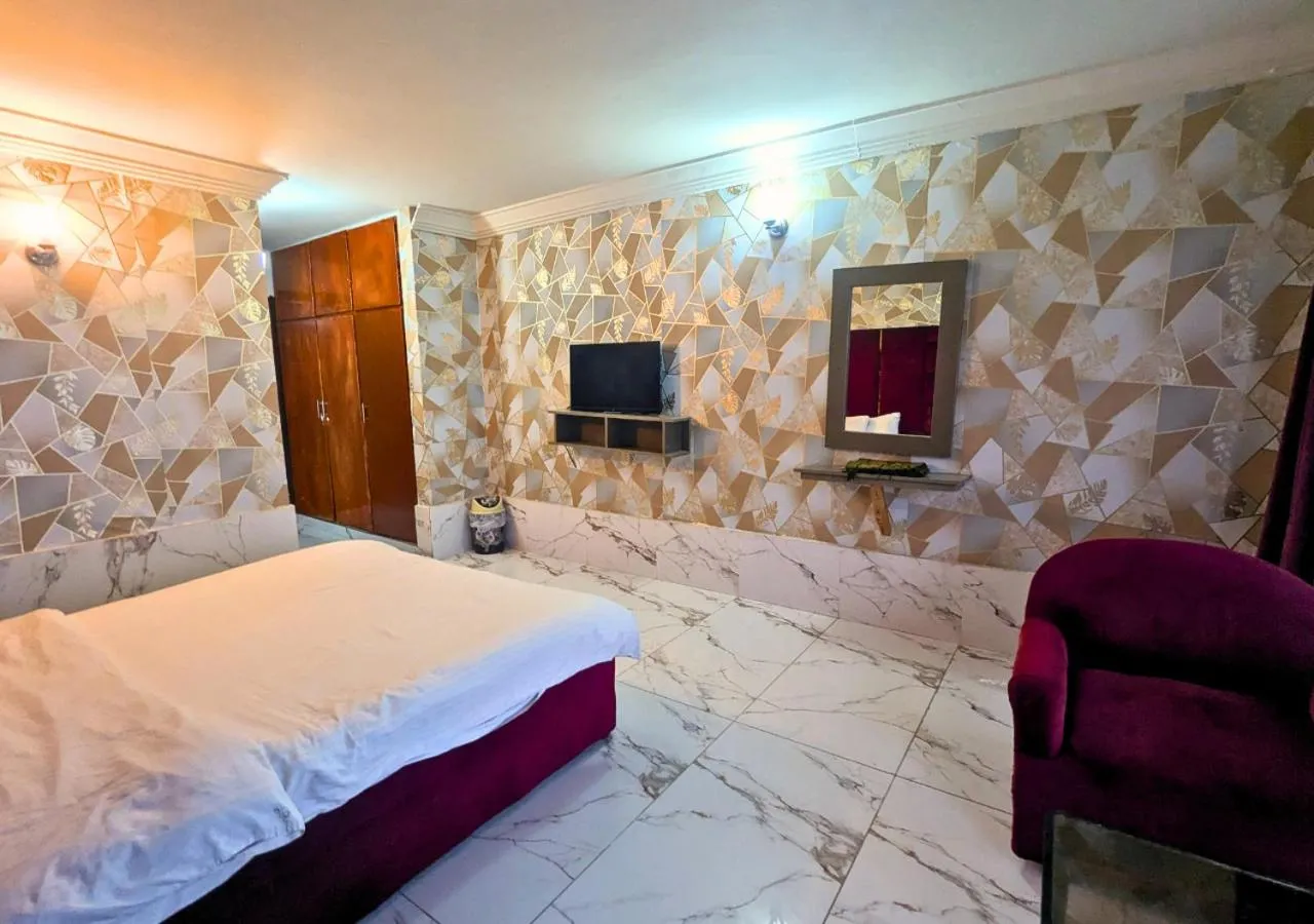 Bed in Grand Heights Hotel