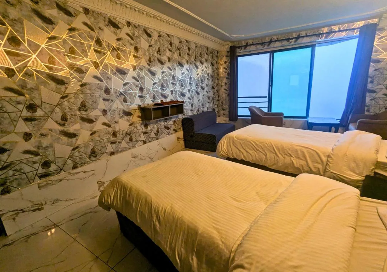 Bed in Grand Heights Hotel