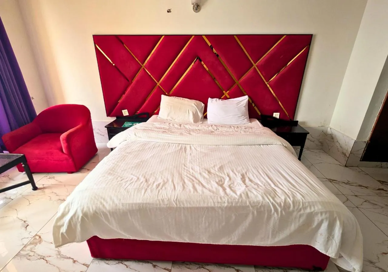 Bed in Grand Heights Hotel