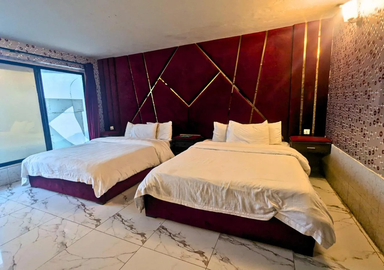 Bed in Grand Heights Hotel